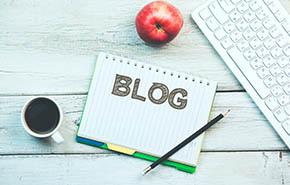 Blog word on notepad and keyboard 