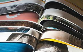 Opened magazines. Printed publications